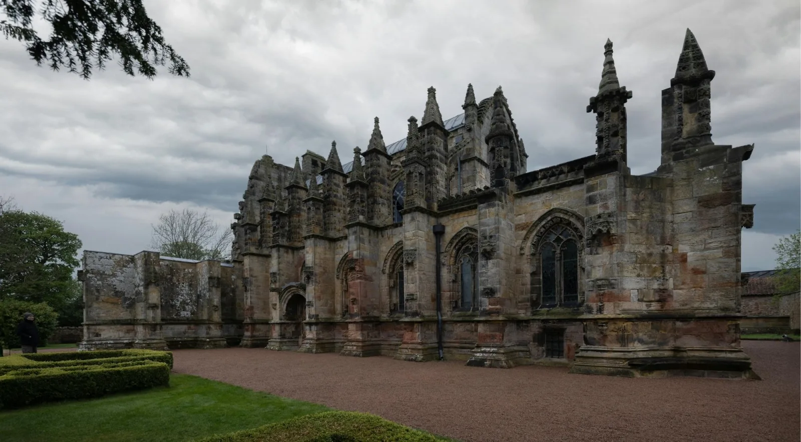 The carved west front and pinnacles of Rosslyn Chapel in Midlothian, Scotland