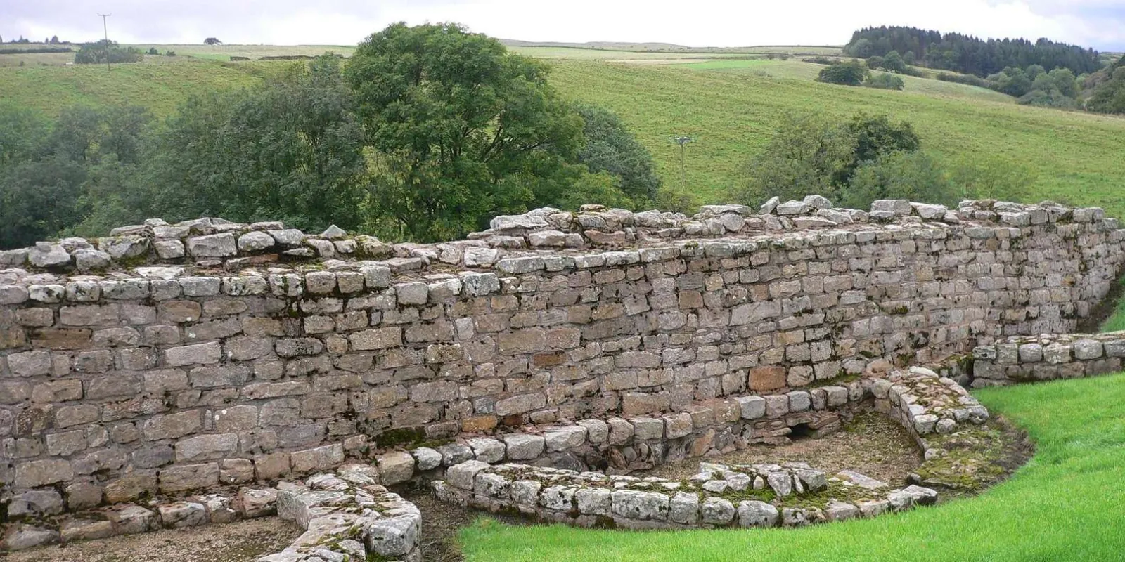 Thick coursed masonry of a Roman fort wall on Hadrian's Wall