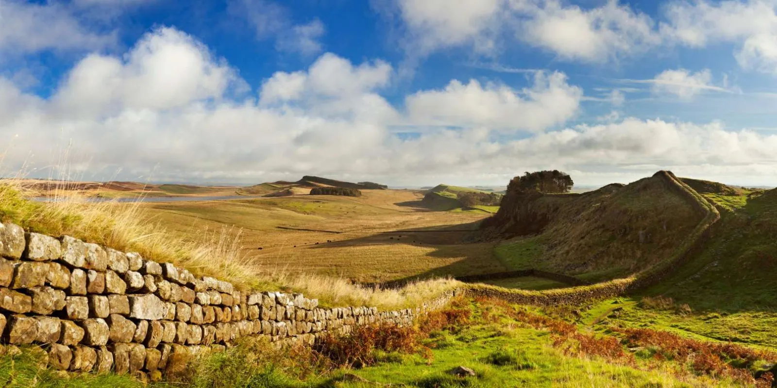 Hadrian's Wall on the escarpment at Housesteads under a wide Northumberland sky